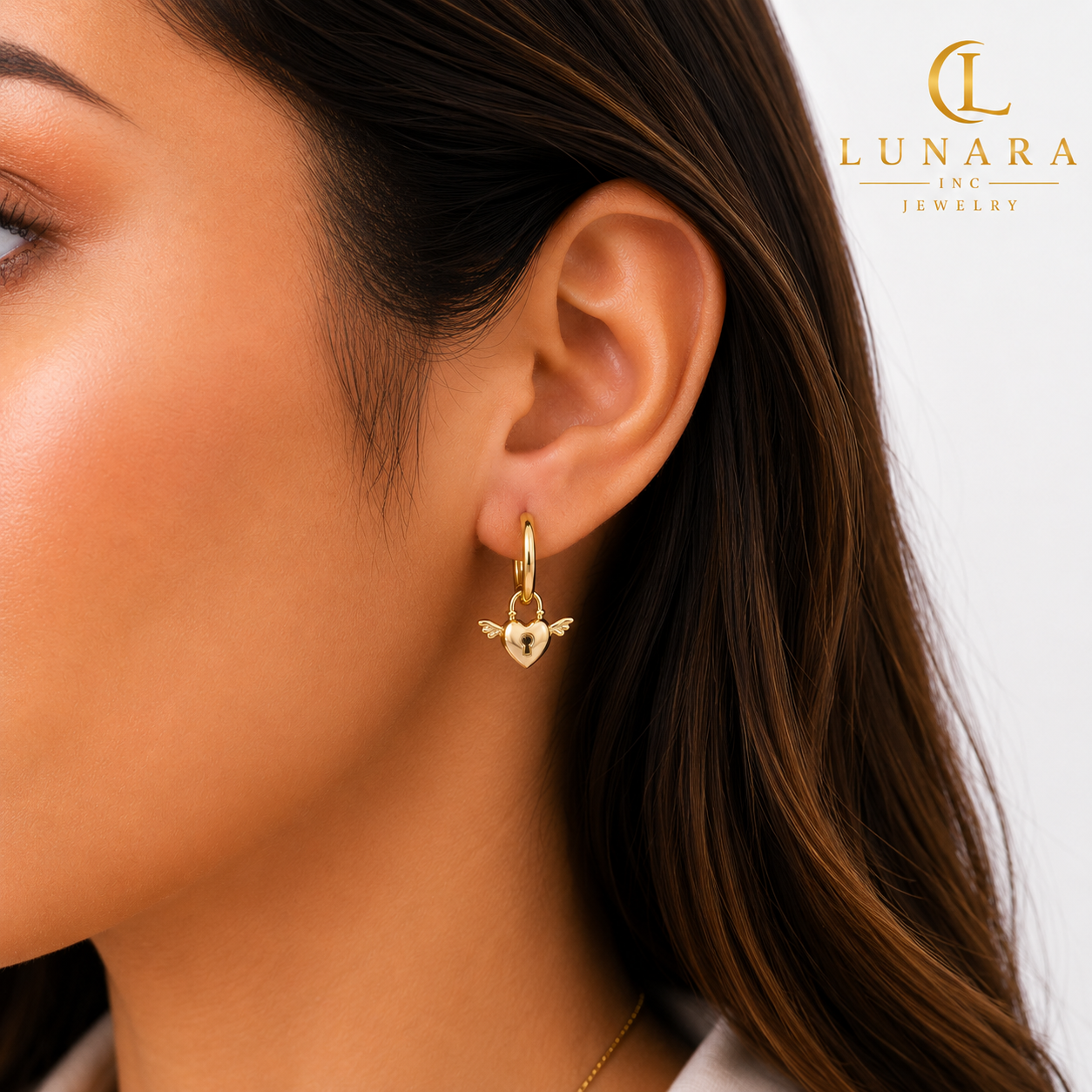 Winged Heart Lock Huggie Earrings